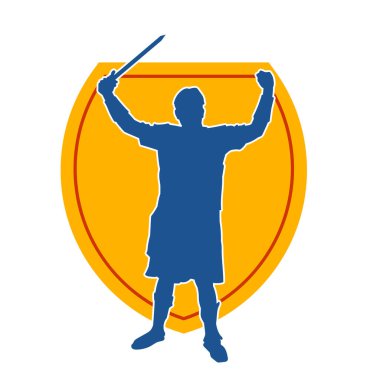 Savaş zırhı giymiş bir erkek savaşçının silueti. Kılıç ile poz veriyor..