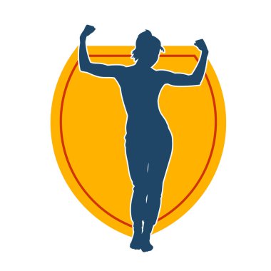 Sıska, sağlıklı bir kadının silüeti kol kasını gösteriyor. Vücut hatları iyi olan bir kadının silüeti..