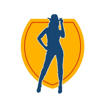 Kovboy kostümü giymiş zayıf bir kadın modelin silueti. Kovboy şapkası takan kovboy kız silueti..