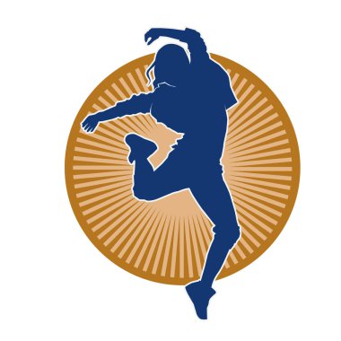 Modern dansçı pozunun silueti. Hip hop dansı yapan genç bir kızın silueti.