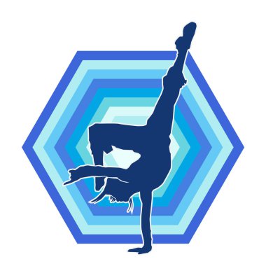 Dans eden ve amuda kalkma pozu veren genç bir kızın silueti. 