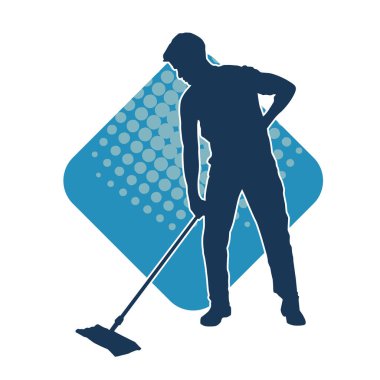 Temizlik işi yapan bir erkeğin silueti. Temizlik servisinin silueti paspas aracıyla yerleri süpürüyor.