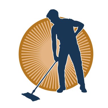 Temizlik işi yapan bir erkeğin silueti. Temizlik servisinin silueti paspas aracıyla yerleri süpürüyor.