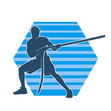 Sportif bir adamın silueti savaş halatıyla egzersiz yapıyor. 