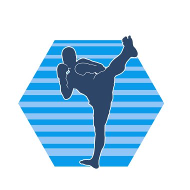 Hareketli erkek kickboksör atletinin silueti. Tekme atan bir adamın silueti..