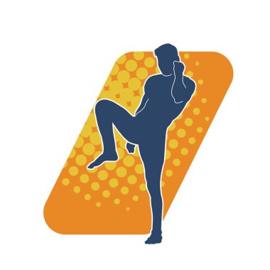 Hareketli erkek kickboksör atletinin silueti. Tekme atan bir adamın silueti..