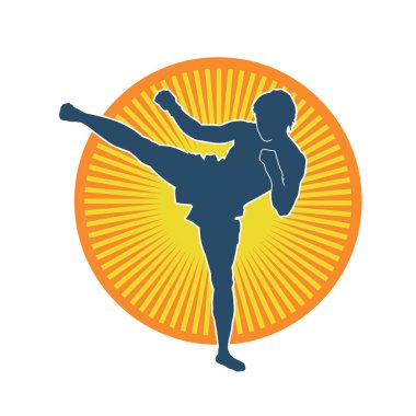 Hareketli erkek kickboksör atletinin silueti. Tekme atan bir adamın silueti..