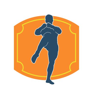 Hareketli erkek kickboksör atletinin silueti. Tekme atan bir adamın silueti..