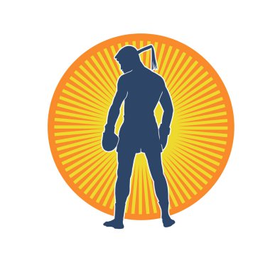 Hareketli erkek kickboksör atletinin silueti. Kickboks yapan bir adamın silueti.