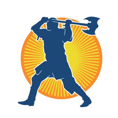 Muharebe halindeki bir savaşçının silueti savaş baltası ile poz veriyor.