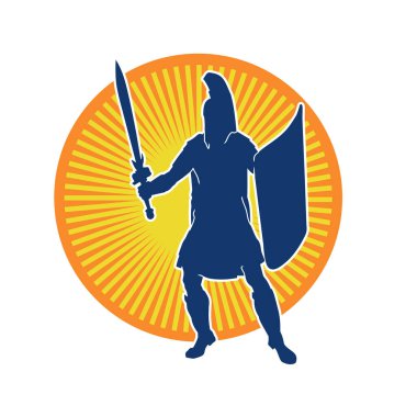 Eski bir Romalı askerin silueti. Kılıç ve demir kılıçla poz vermiş..