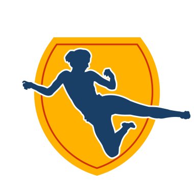 Dövüş sanatları tekmesi atan bir kadının silueti. Sportif bir kadının silueti tekme hareketi yapıyor..