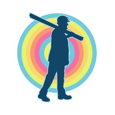 Tahta taşıyan bir inşaat işçisinin silueti..