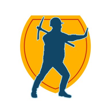 Görev sırasında baltayla dolaşan işçi kostümlü bir adamın silüeti. Bir madencinin hareket halindeki silueti balta aracı ile poz verir.