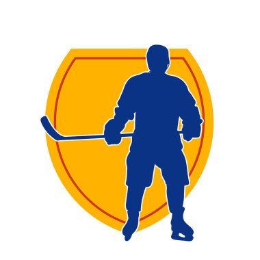 Kasklı ve üniformalı bir buz hokeyi oyuncusunun silueti.