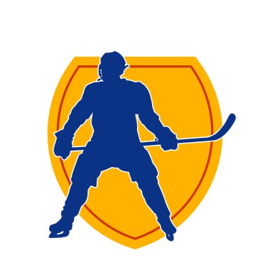 Kasklı ve üniformalı bir buz hokeyi oyuncusunun silueti.