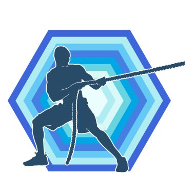 Sportif bir adamın silueti savaş halatıyla egzersiz yapıyor. 