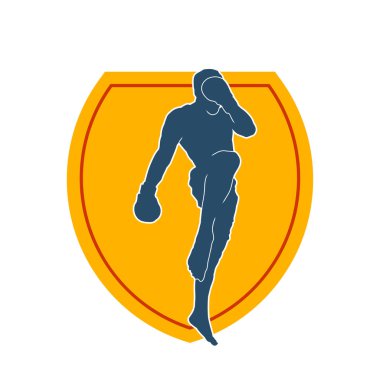 Hareketli erkek kickboksör atletinin silueti. Tekme atan bir adamın silueti..