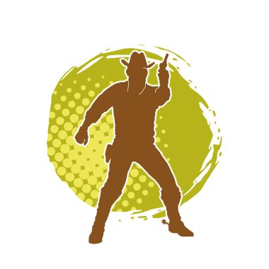 Bir kovboyun silueti tabancasını taşıyor. Atış pozisyonunda kovboy kostümü giyen bir adamın silueti..