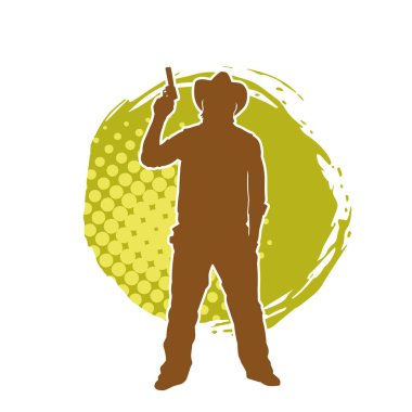 Bir kovboyun silueti tabancasını taşıyor. Atış pozisyonunda kovboy kostümü giyen bir adamın silueti..