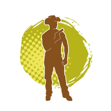 Bir kovboyun silueti tabancasını taşıyor. Atış pozisyonunda kovboy kostümü giyen bir adamın silueti..