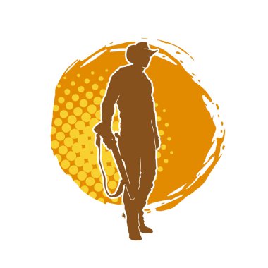 Safari kostümü giymiş, kovboy şapkası takmış tüfeğiyle ateş eden bir avcının silueti. Kovboy kıyafetli bir adamın silueti uzun namlulu silahıyla ateş ediyor..
