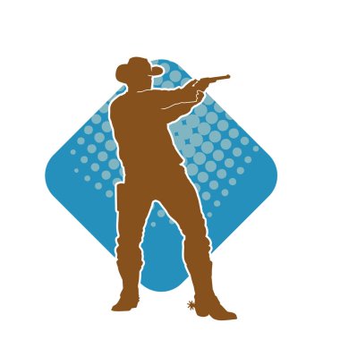 Bir kovboyun silueti tabancasını taşıyor. Atış pozisyonunda kovboy kostümü giyen bir adamın silueti..