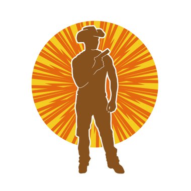 Bir kovboyun silueti tabancasını taşıyor. Atış pozisyonunda kovboy kostümü giyen bir adamın silueti..