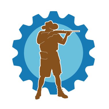 Safari kostümü giymiş, kovboy şapkası takmış tüfeğiyle ateş eden bir avcının silueti. Kovboy kıyafetli bir adamın silueti uzun namlulu silahıyla ateş ediyor..