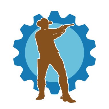 Bir kovboyun silueti tabancasını doğrultuyor. Atış pozisyonunda kovboy kostümü giyen bir adamın silueti..