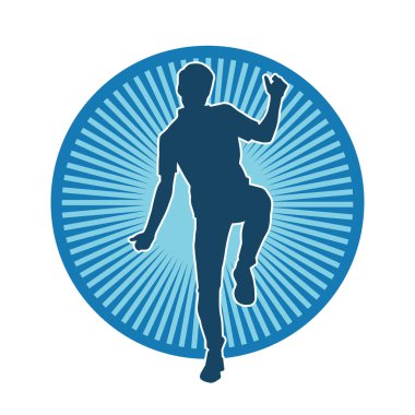 Hareket halindeki bir erkek dansçının silueti. Dans eden zayıf bir adamın silueti..