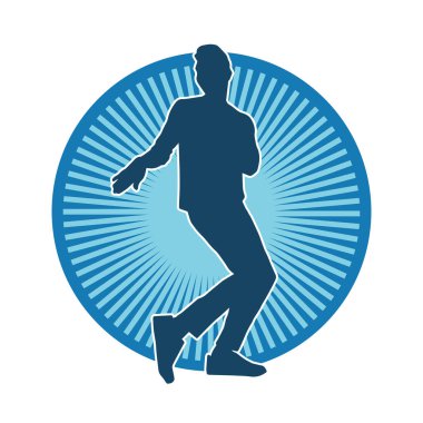 Hareket halindeki bir erkek dansçının silueti. Dans eden zayıf bir adamın silueti..