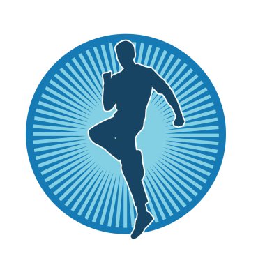 Hareket halindeki bir erkek dansçının silueti. Dans eden zayıf bir adamın silueti..