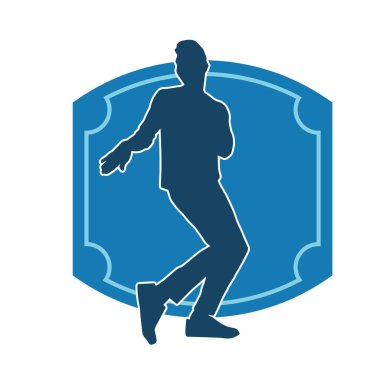 Hareket halindeki bir erkek dansçının silueti. Dans eden zayıf bir adamın silueti..