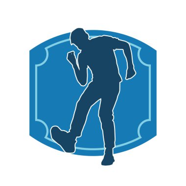 Hareket halindeki bir erkek dansçının silueti. Dans eden zayıf bir adamın silueti..