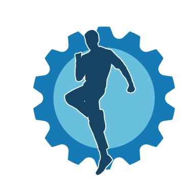 Hareket halindeki bir erkek dansçının silueti. Dans eden zayıf bir adamın silueti..