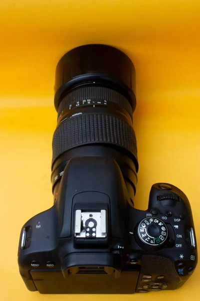 Dslr Camera Yellow Background — стоковое фото