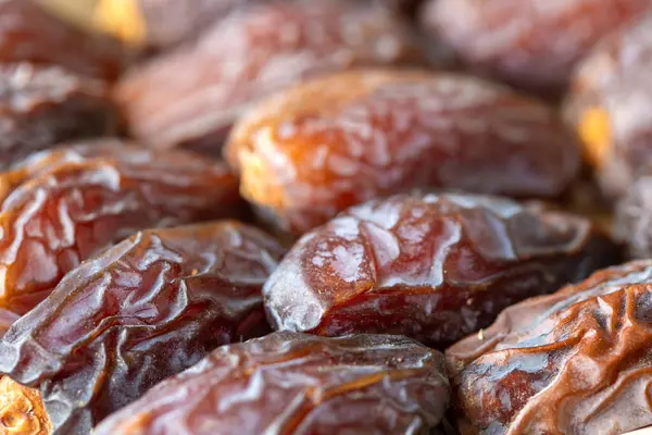 Taze hurma meyvelerinin makro fotoğraflarıyla desen