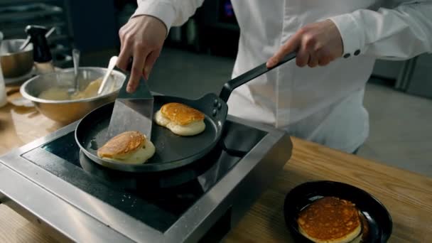 Chef Flips Pancake Pan Using Spatula — Stock Video