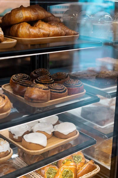 stock image Counter full of delicious buns and pastries in shop, bakery