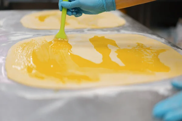 Kitchen Bakery Process Making Cinnabons Woman Baker Uses Egg Yolk — Stock Photo, Image
