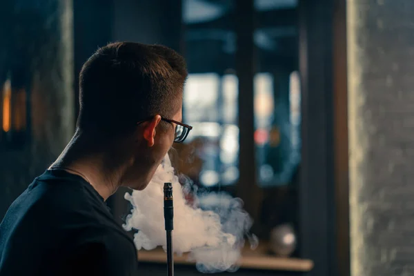 Hookah Man Glasses Smokes Traditional Hookah Pipe Man Exhales Smoke — Stock Photo, Image
