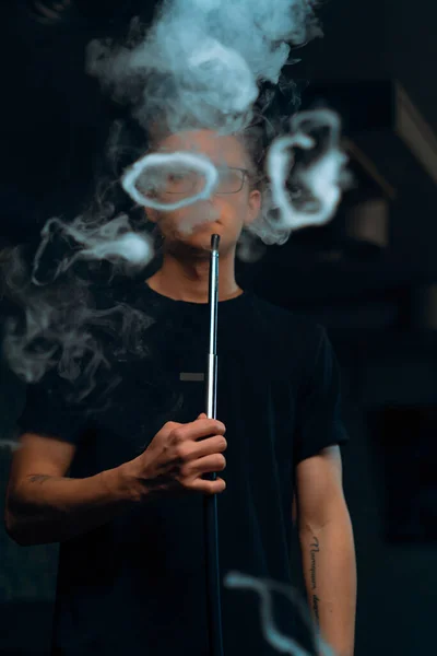Man Glasses Smokes Traditional Hookah Pipe Man Exhales Rings Thick — Stock Photo, Image
