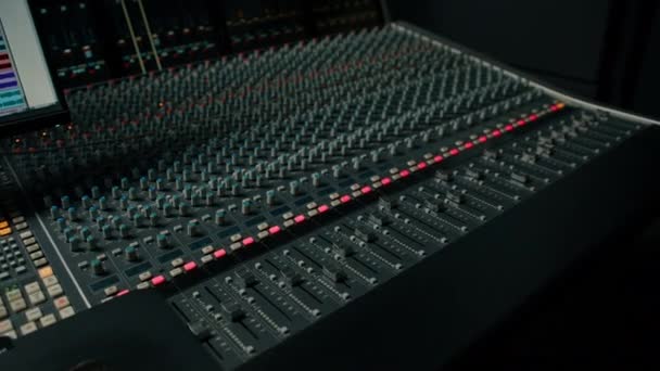 Close Mixer Console Hand Adjusting Faders Sound Engineer Works Studio — Stock Video