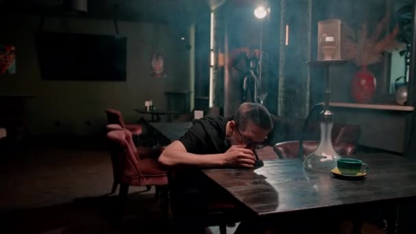Young Guy Smoking Hookah Hookah Man Exhales Thick White Smoke — Stock Video