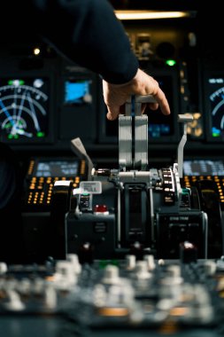 An airplane pilot controls the throttle during flight takeoff View from inside the cabin clipart