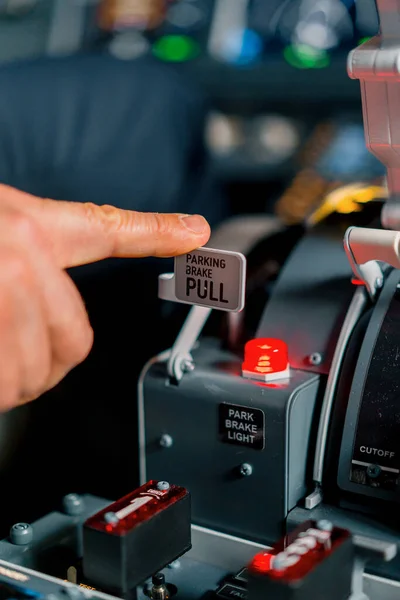 Close Control Panel Airplane Cockpit Pilot Presses Parking Brake Button — Stock Photo, Image