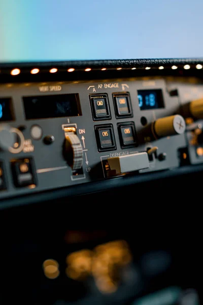 A detailed shot of the control and navigation panel in the cockpit of Boeing 737 Flight Simulator passenger plane