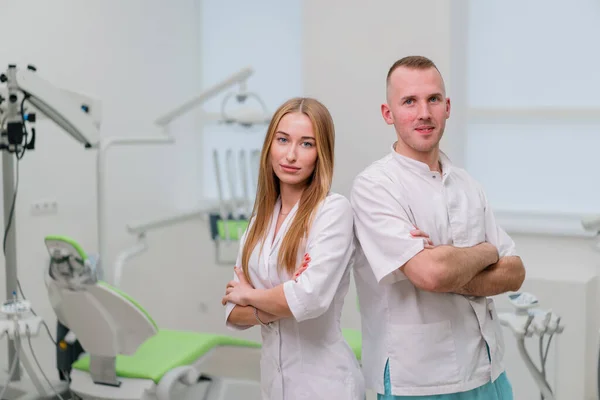 Portrait Beautiful Young Smiling Colleagues Dentists Standing Dental Office Start — Stock Photo, Image