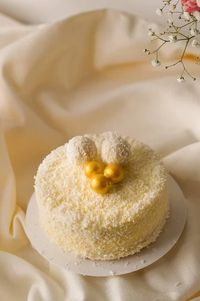 Delicious Fresh Cream Sponge Cake Decorated Coconut Candies Beige Fabric — Stock Photo, Image